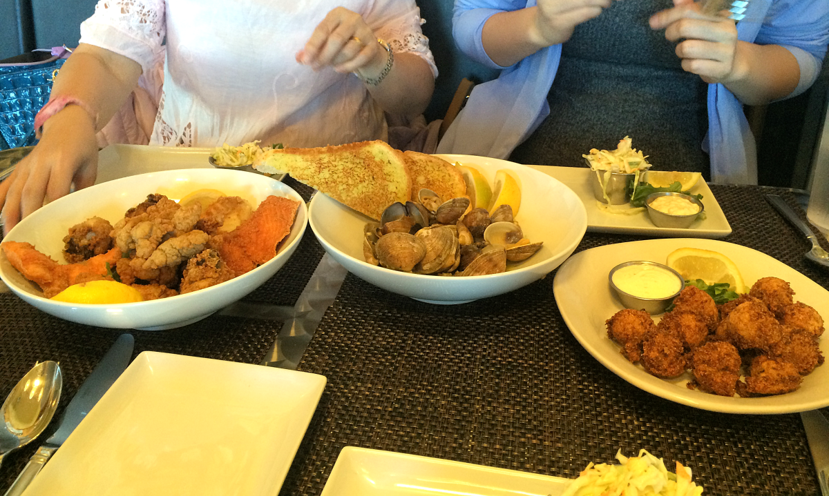 Jig and Fish Lure Co.: (L to R) Fried cod and salmon, steamed clams, crab hush puppies